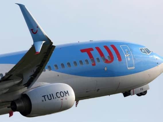 Travel company Tui has cut its summer holiday schedules amid new coronavirus restrictions in Europe. PA.