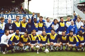 CHAMPIONS: Leeds United with the 1991-92 Football League Division One trophy. Photo by Getty Images.