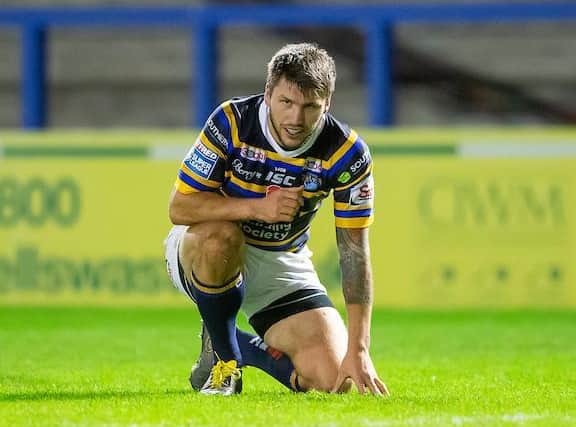 Tom Briscoe shows his disappointment after Rhinos' play-offs exit against Catalans Dragons last year. Picture by Allan McKenzie/SWpix.com .