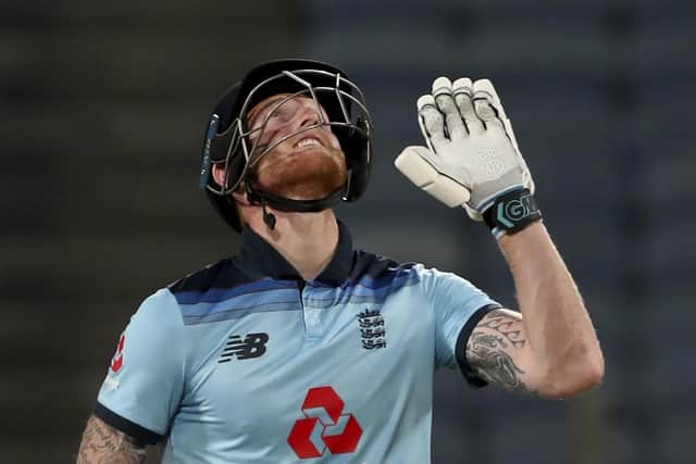 England's Ben Stokes reacts as he walks off the field after losing his wicket at 99 during the second One Day International cricket match between India and England at Maharashtra Cricket Association Stadium in Pune, India. (AP Photo/Rafiq Maqbool)