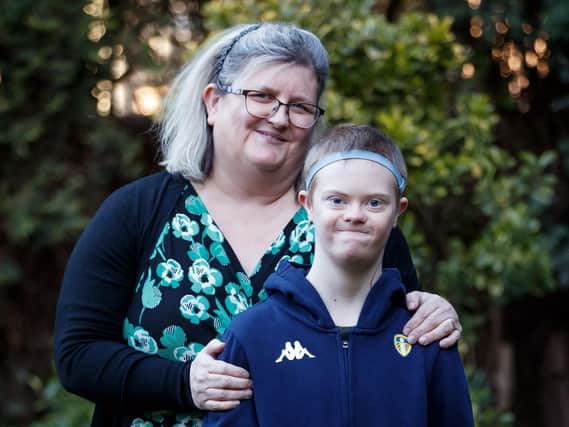 Ann-Marie Sheard with her son Isaac, who has Down Syndrome and is classed as clinically extremely vulnerable (CEV), at their home in Ackworth. PIC: PA