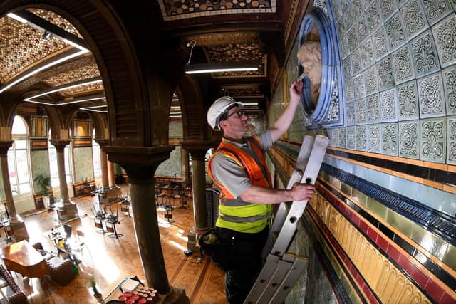 Specialist cleaner Steve Hartley cleans one the Busts in the Tiled Hall cafe at Leeds Art Gallery. PIC: Simon Hulme