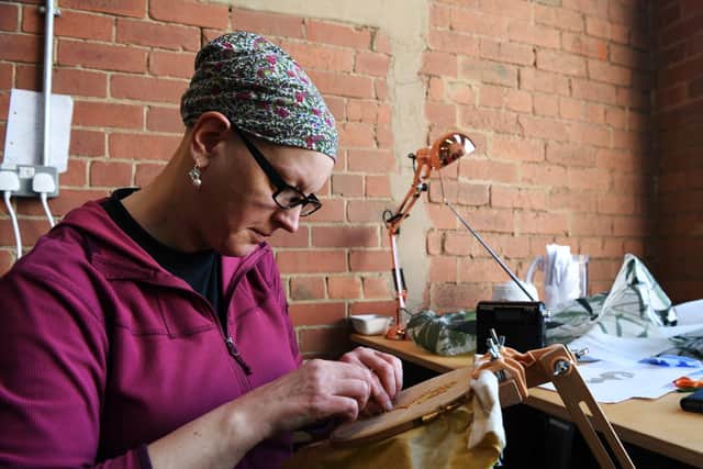 Artist Eilidh Gilmour working in her studio at at Sunnybank Mills in Farsley.