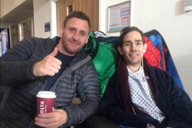 Brendan with his close friend Phillip Hardwell while he was in hospital