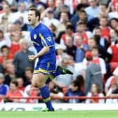 ELATION: Leeds United striker Mark Viduka celebrates his 88th-minute in the epic 3-2 success at Arsenal of May 2003. Picture by Tom Hevezi/PA Wire.
