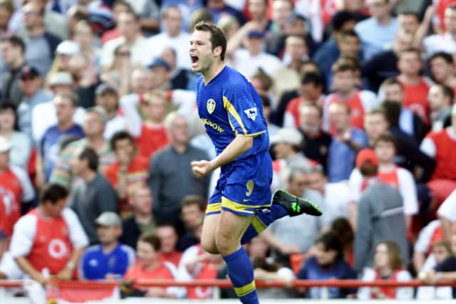 ELATION: Leeds United striker Mark Viduka celebrates his 88th-minute in the epic 3-2 success at Arsenal of May 2003. Picture by Tom Hevezi/PA Wire.