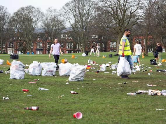 Woodhouse Moor was covered in litter after crowds were seen out drinking and socialising in the sun on Tuesday (photo: SWNS)