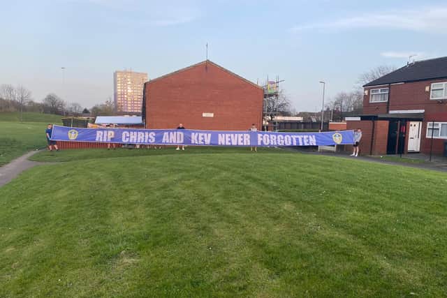 Two young Leeds United fans unveil flag in memory of Kevin Speight and Christopher Loftus after raising more than £4,000