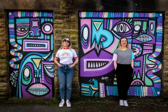 Founders of CA Spaces (left to right) Angie Talbot, and Sarah Priestley, in front one of the many murals found around the area. Photo: James Hardisty