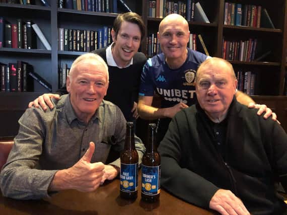 LUSCOS members Svend Karlsen and Anders Palm present Eddie Gray and Peter Lorimer with their special edition beer in February 2020.