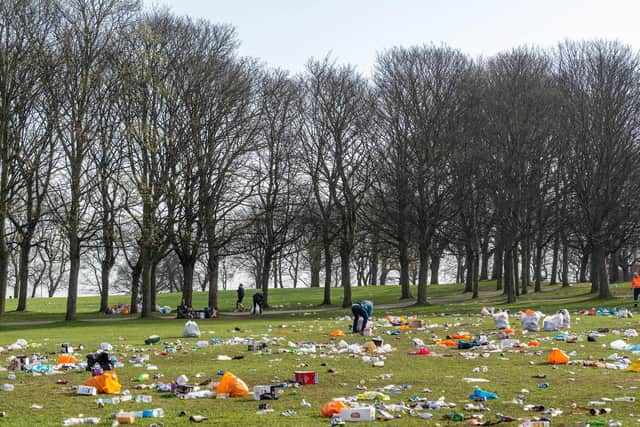 Massive clean-up operation by some students, residents and Leeds City Council on Woodhouse Moor, Headingley, Leeds, after hundreds of people gathered yesterday March 30) to enjoy the warm weather and into the evening resulting in leaving behind tons of litter, bottles, food, disposable barbecue and hundreds of used nitrous oxide canisters (laughing gas).

Photo: James Hardisty