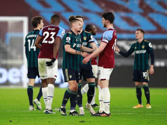 Leeds United's Kalvin Phillips and West Ham's Declan Rice greet after their Premier League meeting. Pic: Getty