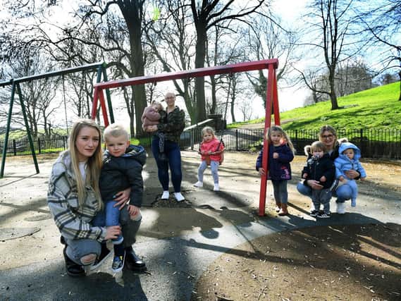 Lucy Williams and her son Freddie pictured at Western Flatts Park with other mums and kids who are campaigning to have the play area renovated