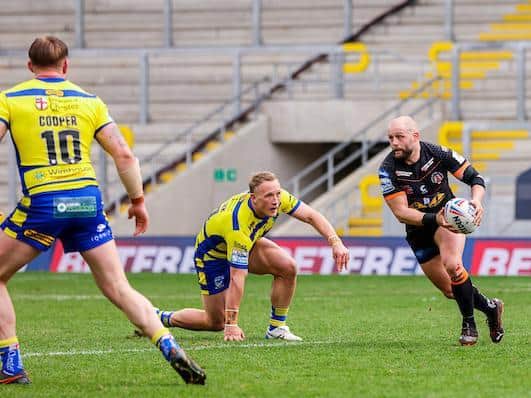 Former Rhinos hooker Paul McShane, pictured in possession against Warrington last week, is set to make his 150th appearance for Tigers. Picture by Alex Whitehead/SWpix.com.