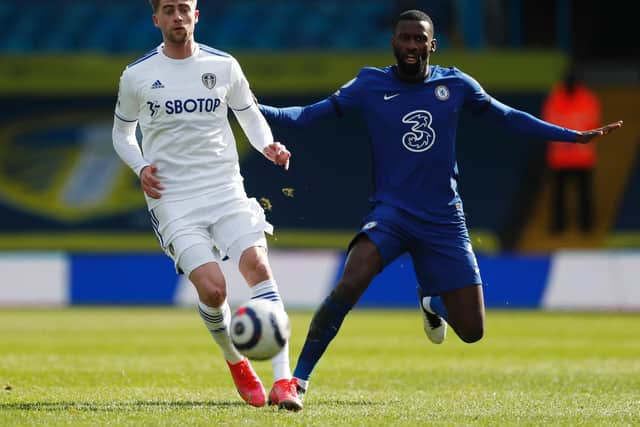 BACK IN BUSINESS: Leeds United striker Patrick Bamford, left, pictured battling it out with Antonio Rudiger in last month's goalless draw against Chelsea at Elland Road. Photo by Lee Smith - Pool/Getty Images.