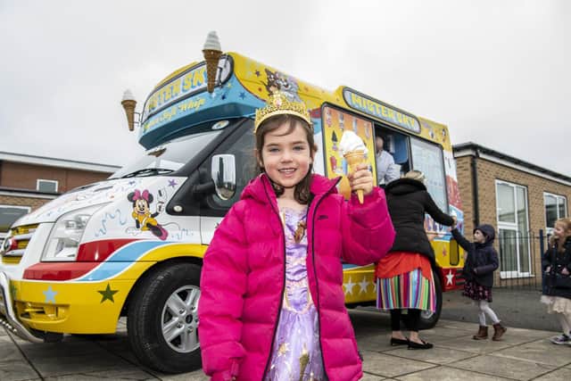 Jessica Turner  enjoys an ice cream at the 'Big Drighlington Primary Birthday Celebration',