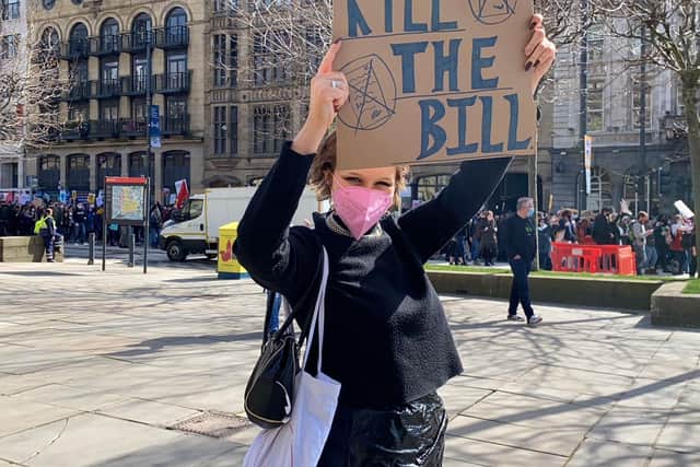 A protester holds a 'Kill the Bill' placard