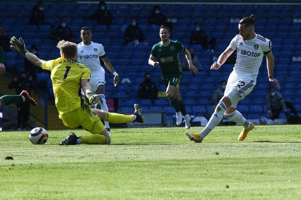 CLOSE: Leeds United winger Jack Harrison, right, is thwarted by Aaron Ramsdale, left, in his bid for a second goal in Saturday's 2-1 win against Sheffield United at Elland Road. Picture by Jonathan Gawthorpe.