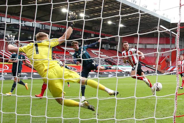 LEAVING IT LATE: Patrick Bamford, centre, and Leeds United finally beat Sheffield United and 'keeper Aaron Ramsdale in the 88th minute of September's clash against Sheffield United at Bramall Lane, above. Photo by Alex Livesey/Getty Images.