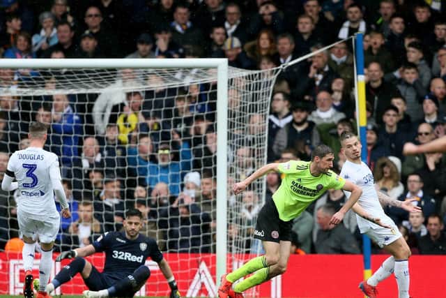 HOW THINGS WERE: From left, Leeds United trio Barry Douglas, Kiko Casilla and Kalvin Phillips look on as Chris Basham scores the only goal of Sheffield United's 1-0 triumph at Elland Road of March 2018. Picture by Richard Sellers/PA Wire.
