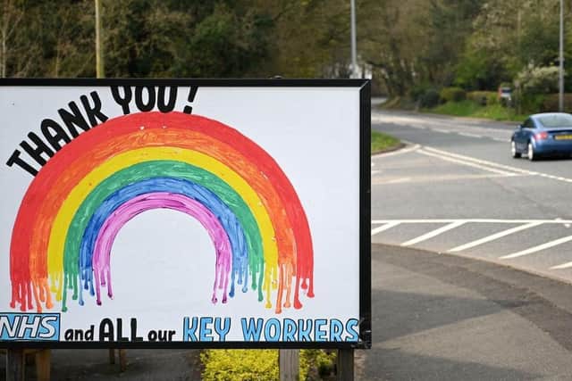 A Thank You NHS sign (Photo by OLI SCARFF/AFP via Getty Images).