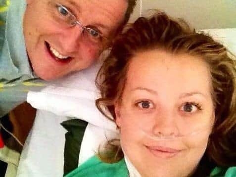 Lauren Pickup pictured in hospital in Nairobi with her father Russell.