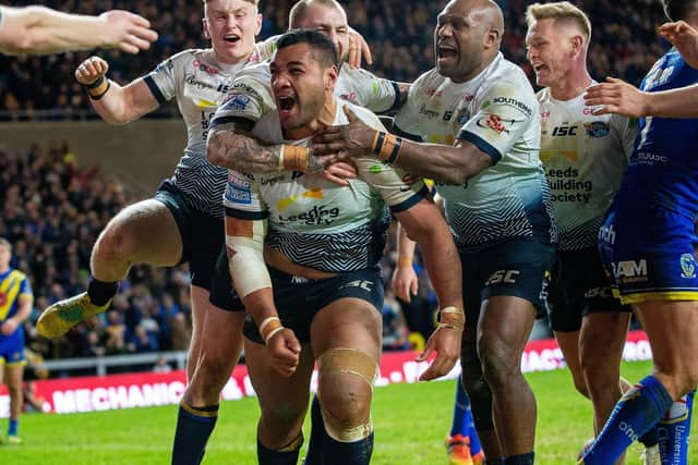 Ava Seumanufagai celebrates his try against Warrington Wolves.