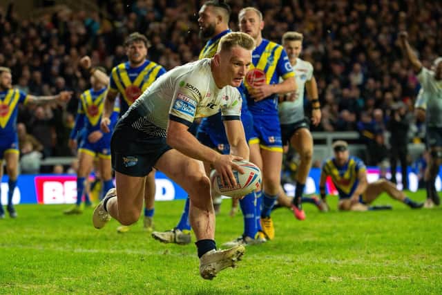 Brad Dwyer touches down against Warrington.