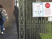 A sign about the coronavirus at an entrance to York Hospital