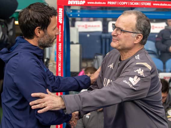 Danny Cowley, left and Marcelo Bielsa have taken very different paths to the Championship (Pic: Bruce Rollinson)