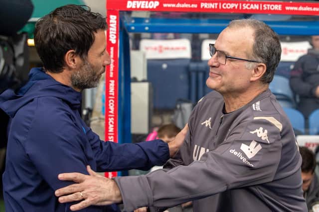 Danny Cowley, left and Marcelo Bielsa have taken very different paths to the Championship (Pic: Bruce Rollinson)