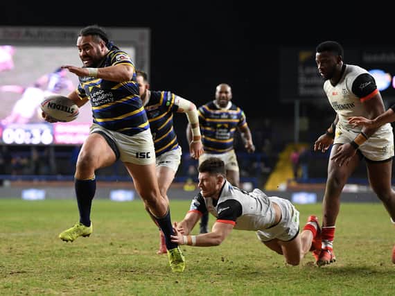 Konrad Hurrell scores Rhinos' 11th try in the final moments. Picture by Jonathan Gawthorpe.
