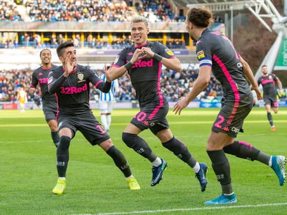 DIFFICULT: Gjanni Alioski celebrates Leeds United's opener in December's 2-0 win at Huddersfield Town but Marcelo Bielsa felt the Terriers provided a tough test and expects an even sterner assignment at Elland Road. Picture by Bruce Rollinson.