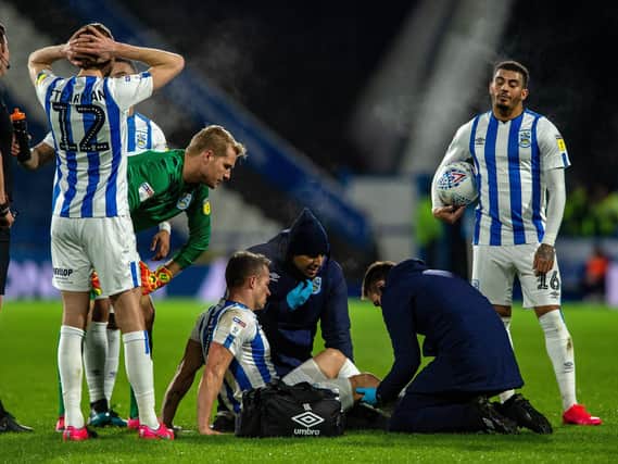 Huddersfield Town captain Jonathan Hogg will miss this weekend's game with Leeds United. (Image: Bruce Rollinson)