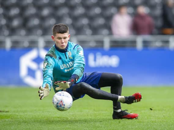 STEPPING UP: Leeds United goalkeeper Illan Meslier in the warm up before last weekend's 4-0 win at Hull City. Picture by Tony Johnson.