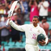 Salute: Australia's Usman Khawaja waves to the crowd after being dismissed.