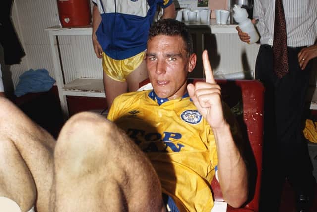 Vinnie Jones celebrates after Leeds United's promotion-winning match against Bournemouth in May 1990. Pic: Ben Radford.