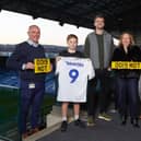 PRIZE WINNER - Patrick Bamford raffled off his limited edition Leeds United centenary shirt and Whites-inspired registration plates to benefit three charities.