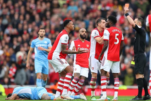 Stuart Attwell dismisses Gabriel during Arsenal's 2-1 defeat to Manchester City. Pic: Catherine Ivill