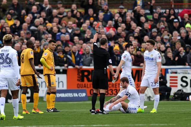 Leeds United captain Liam Cooper is shown red during the Whites' 1-0 defeat to Sutton United in the fourth round of the FA Cup in January 2017. Pic: Jonathan Gawthorpe.