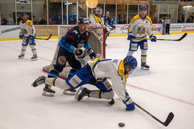 ALL ACTION: Leeds Knights' Archie Hazeldine falls under pressure from Sheffield Steeldogs' James Spurr Picture: Bruce Rollinson