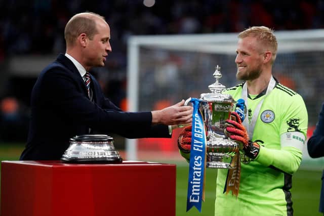 Prince William hands the FA Cup to Kasper Schmeichel, captain of Leicester City, who won the tournament for the first time in 2021. Pic: Matthew Childs.