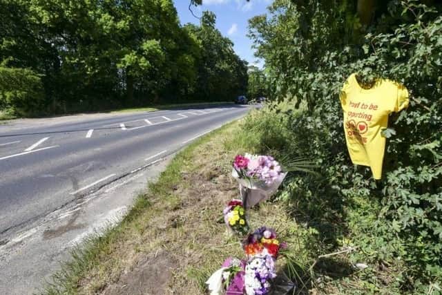 Floral tributes placed at the scene of the tragedy on Castle Syke Hill, Ackworth.