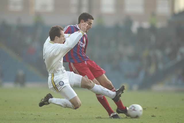 MEMORIES: Former Leeds United star Tony Dorigo, left, challenges Crystal Palace's Kevin Muscatt during an FA Cup third round replay at Elland Road of January 1997. Picture by Mark Thompson/Allsport via Getty Images.