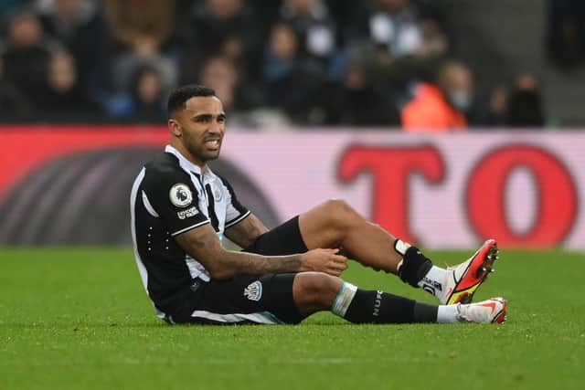 Newcastle United top-scorer Callum Wilson suffers an injury against Manchester United. Pic: Stu Forster.