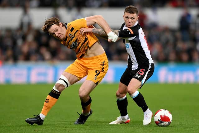 Newcastle United debutant Kieran Trippier challenges Cambridge United match-winner Joe Ironside during the Magpies' FA Cup third round defeat on Saturday. Pic: Stu Forster.