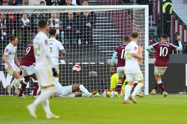 Manuel Lanzini puts West Ham United ahead during Leeds United's 2-0 FA Cup defeat at the London Stadium. Pic: Mike Hewitt.