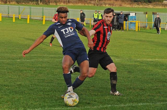 Whitkirk Wanderers' Moussa Diallo scores  his second goal  in the 3-3 draw with West Yorkshire League Premier Division rivals Gomersal and Cleckheaton. Picture: Steve Riding.