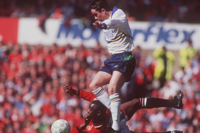 Gary Kelly leaves Manchester United striker Andy Cole in his wake during the Premier League clash at Old Trafford in April 1995. The game finished goalless.