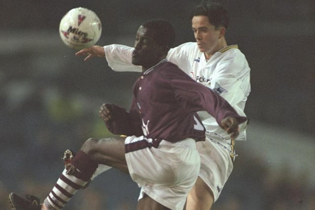 Gary Kelly challenges Derby County's Chris Powell during the Premier League clash at Elland Road in January 1997. The game ended goalless.